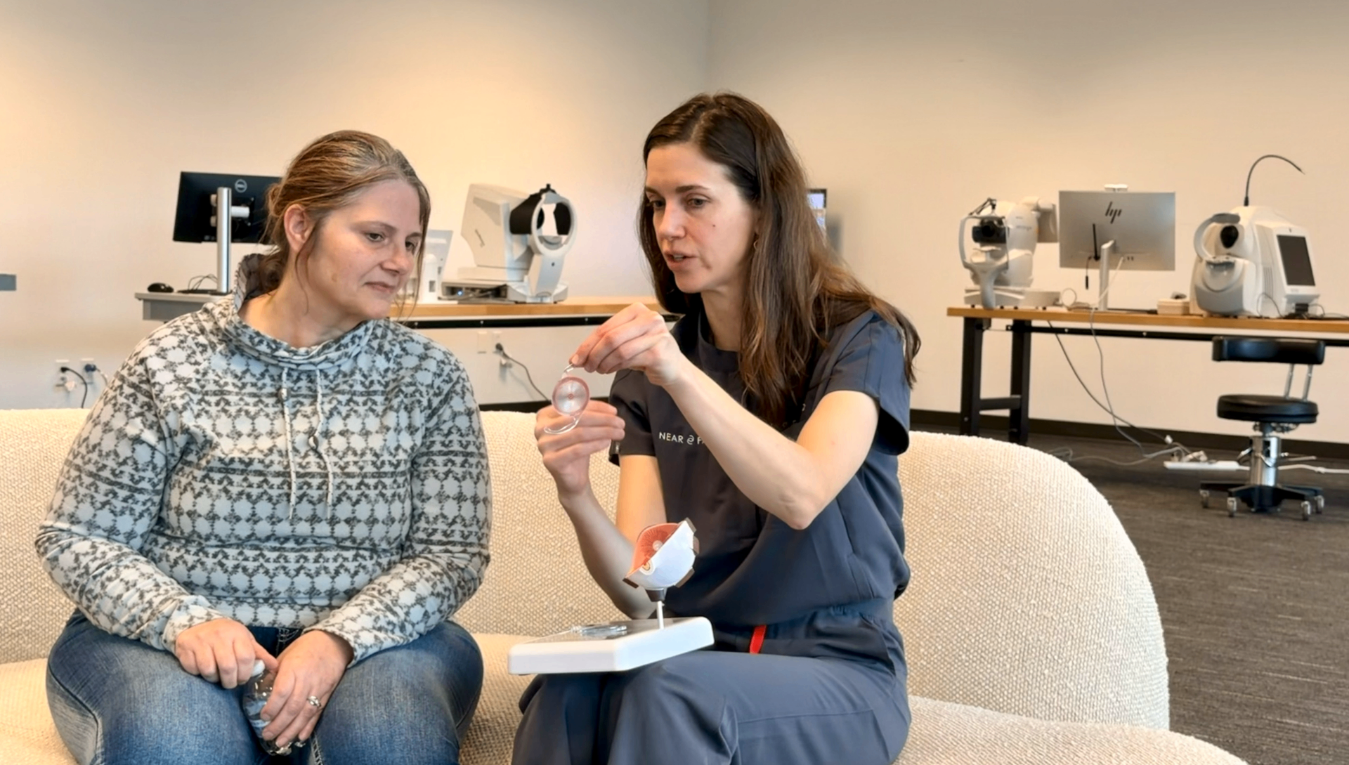 Dr. Ebel educating a patient about vision correction procedures